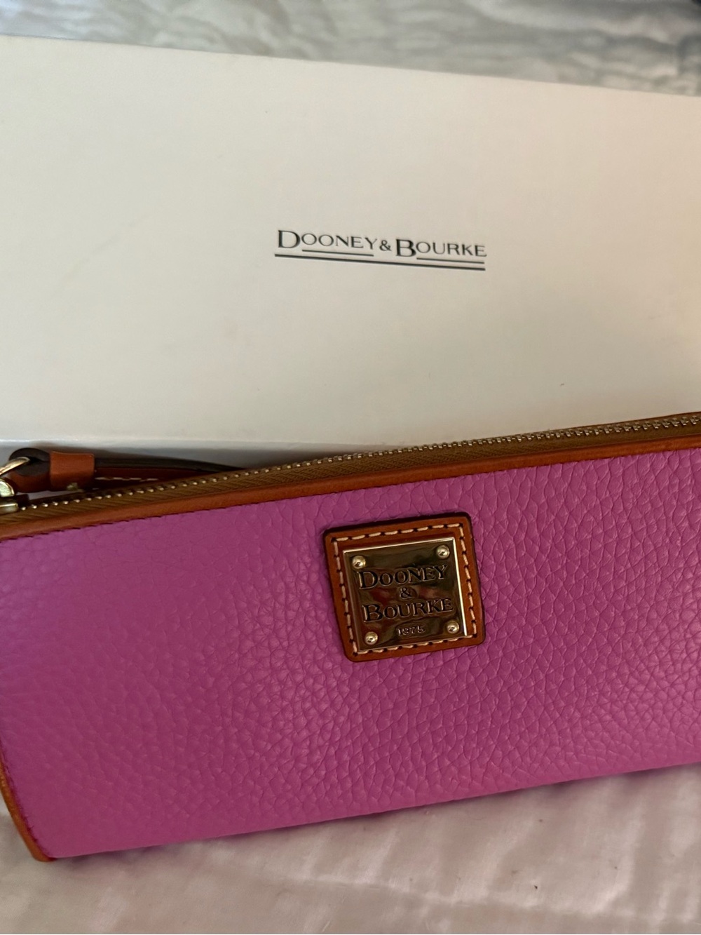 Dooney & Bourke Pink Pebbled Leather wallet with Tan Trim